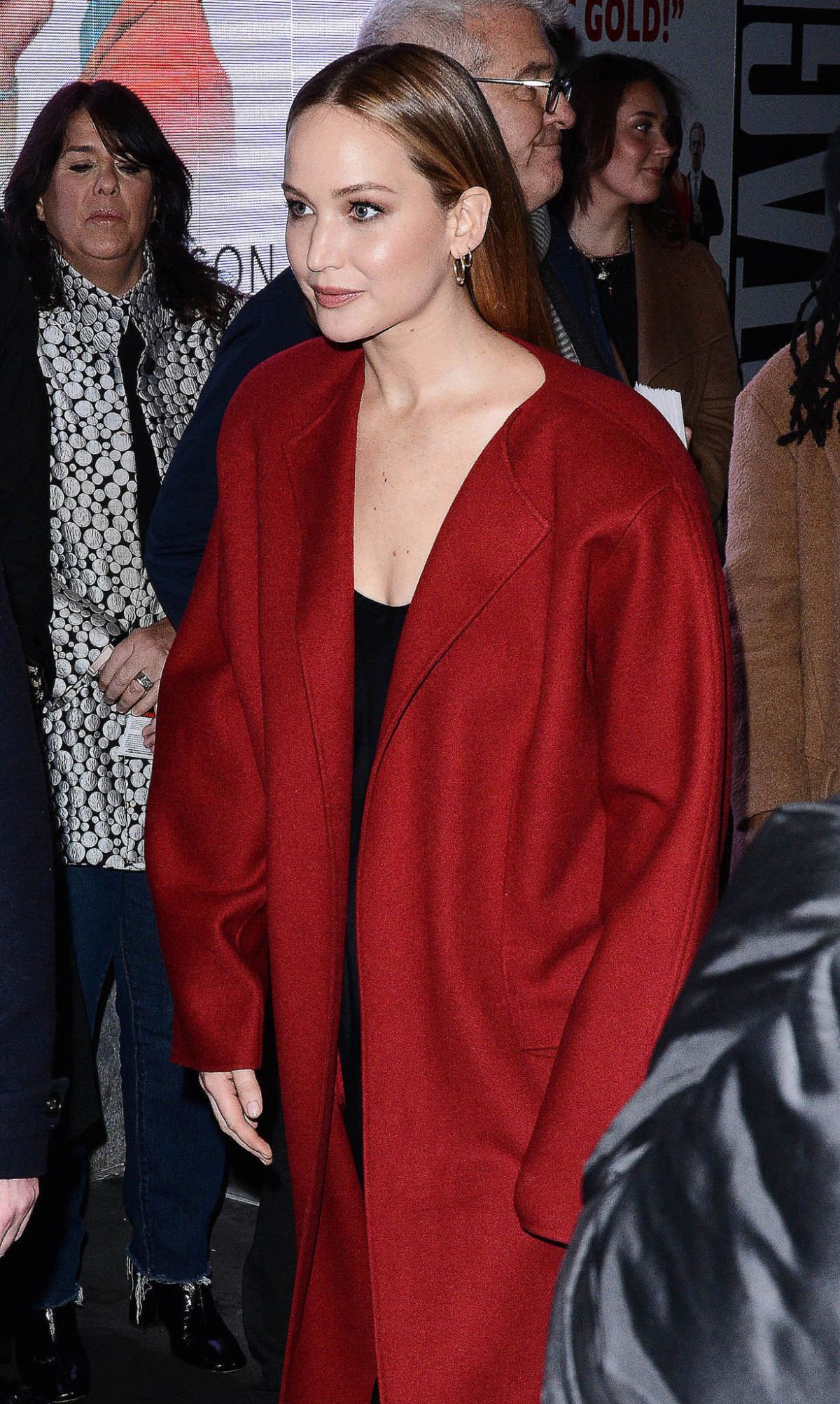 Jennifer Lawrence in red overcoat in NYC