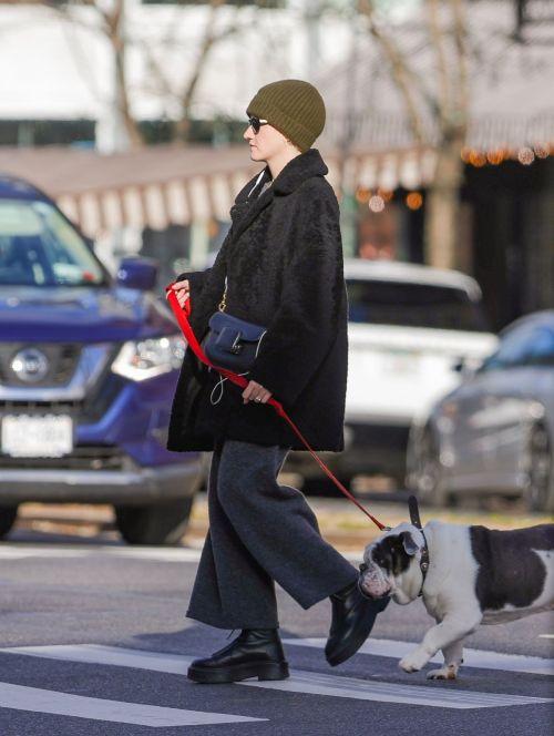 Julia Garner Enjoys a Sunny Stroll with Her Adorable Dog in NYC