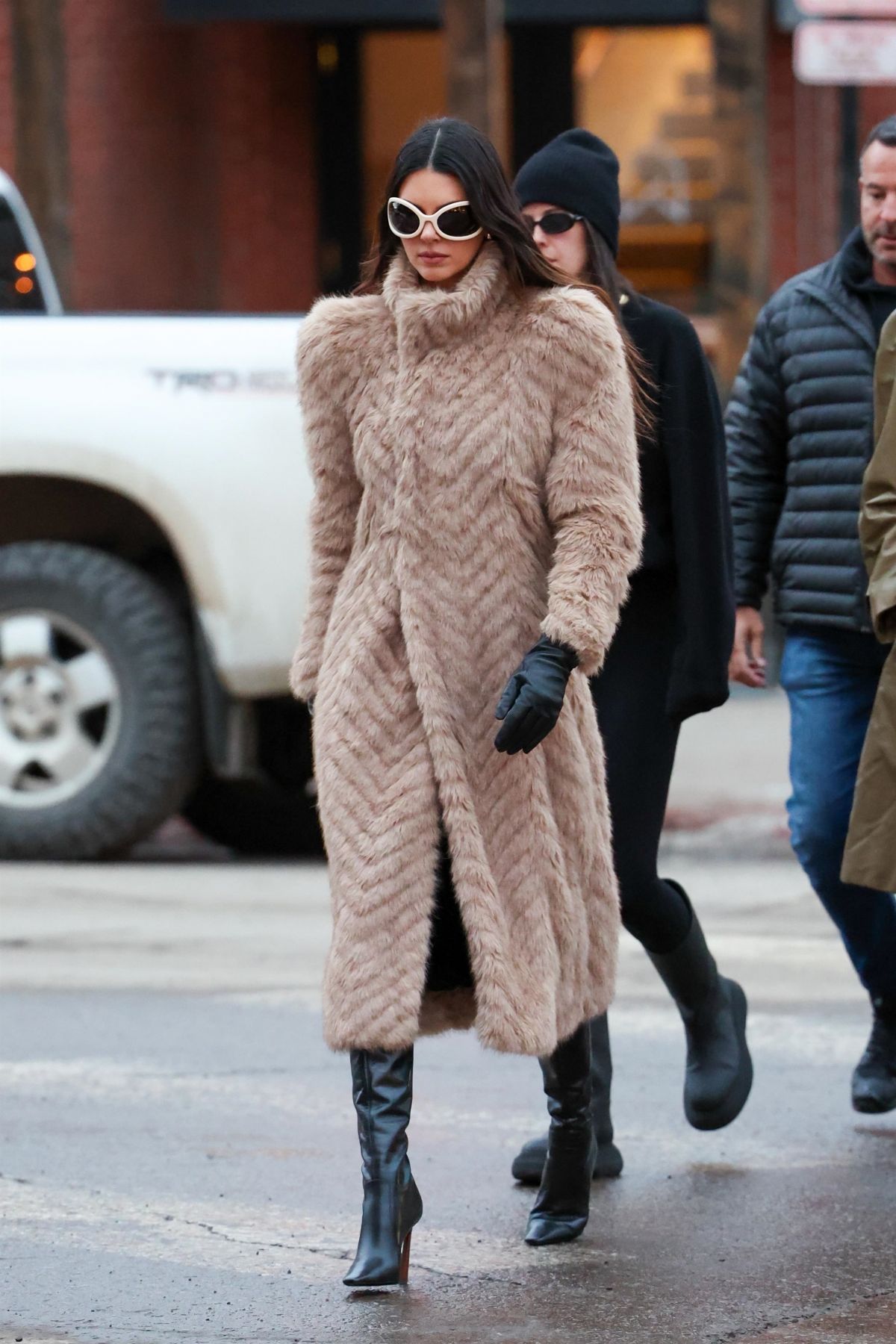 Kendall Jenner in brown fur coat and black boots in Aspen 4