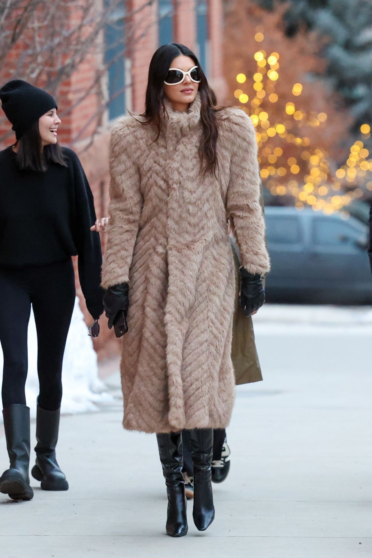 Kendall Jenner in brown fur coat and black boots in Aspen 6