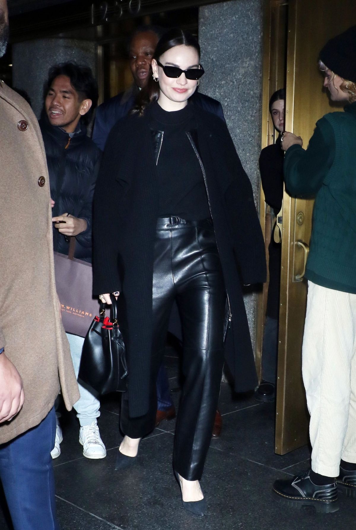 Lily James in black ensemble at Kelly Clarkson Show NYC 1