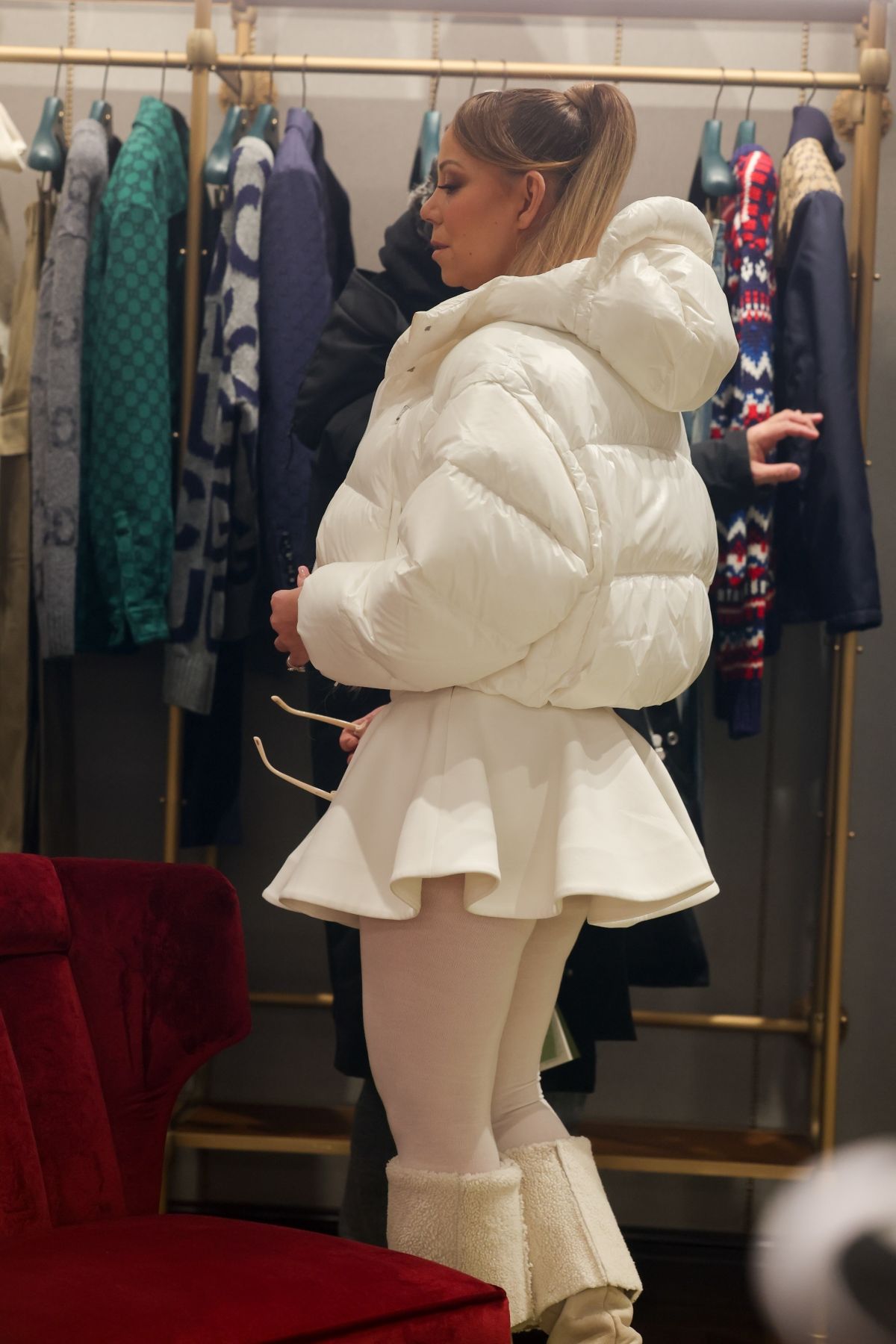 Mariah Carey in White Puffer Jacket and Dress in Aspen 3