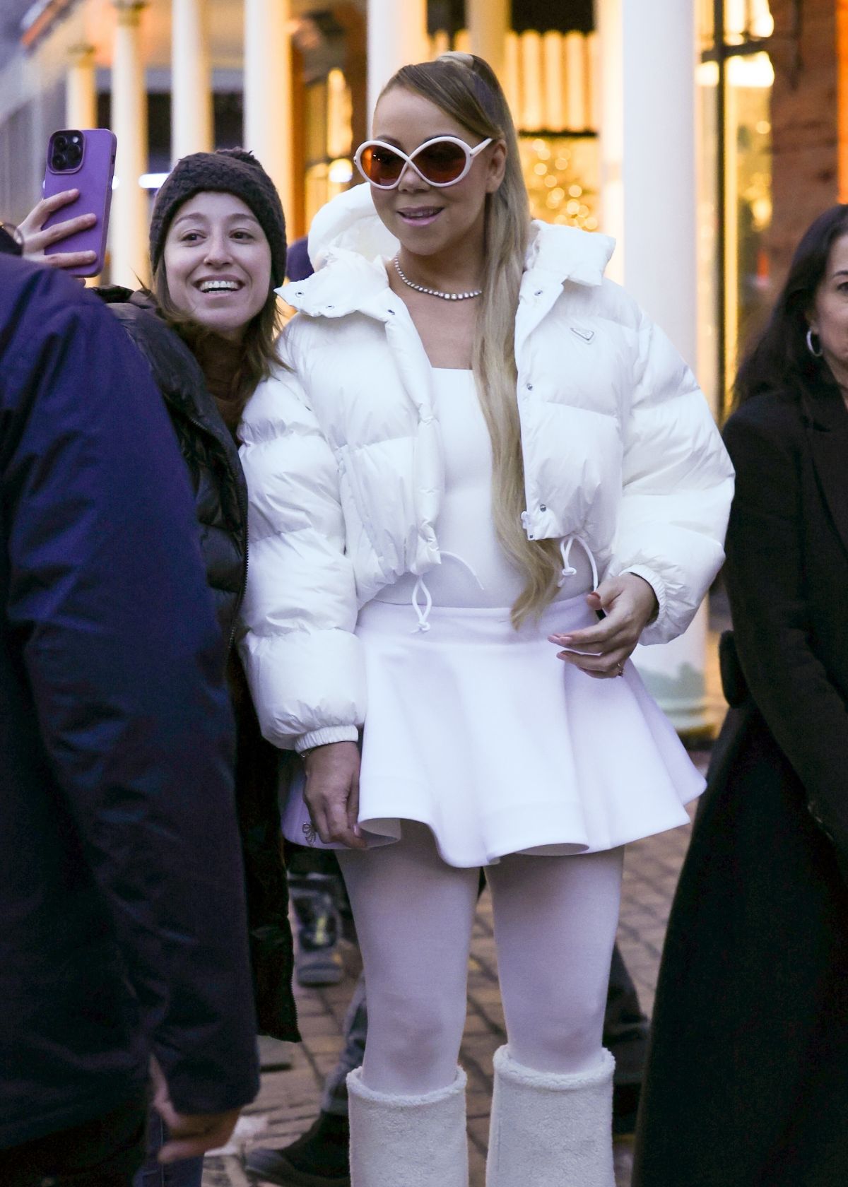 Mariah Carey in White Puffer Jacket and Dress in Aspen