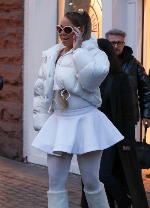 Mariah Carey in White Puffer Jacket and Dress in Aspen 6