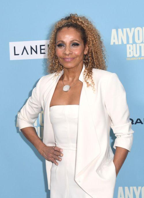 Michelle Hurd in chic white ensemble at 