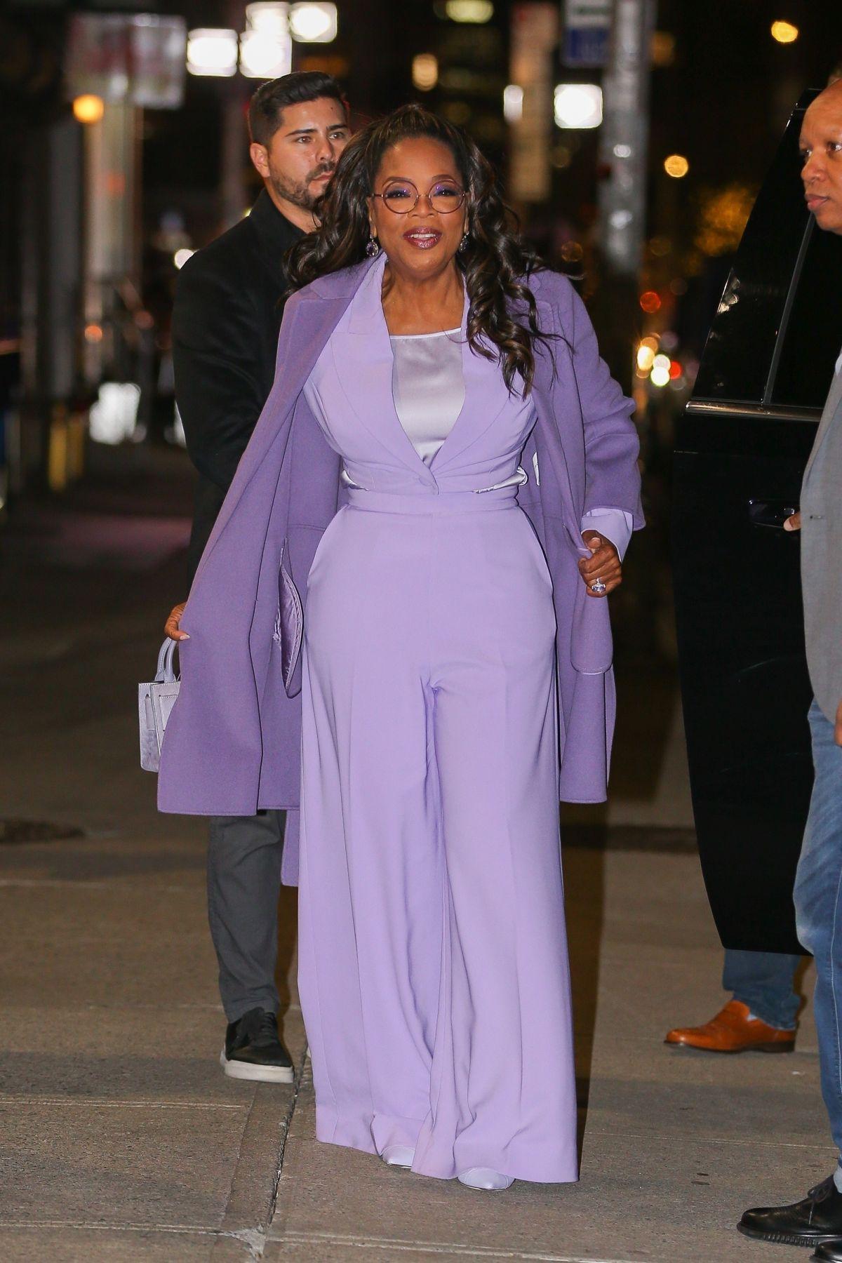 Oprah Winfrey stuns in purple promoting 