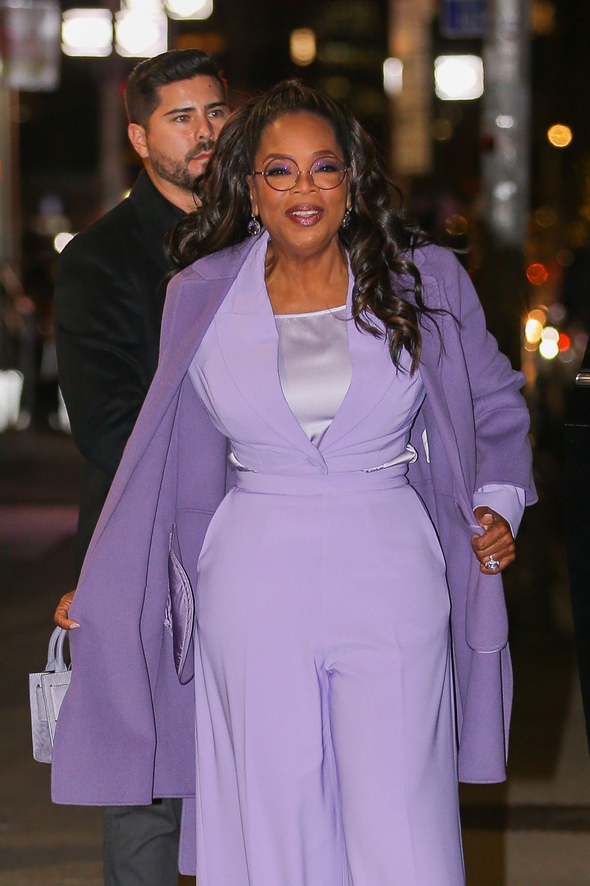 Oprah Winfrey stuns in purple promoting 