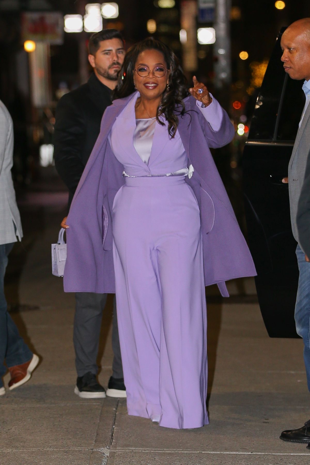 Oprah Winfrey stuns in purple promoting 
