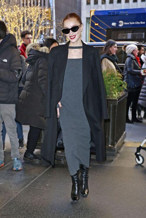 Phoebe Dynevor in elegant overcoat