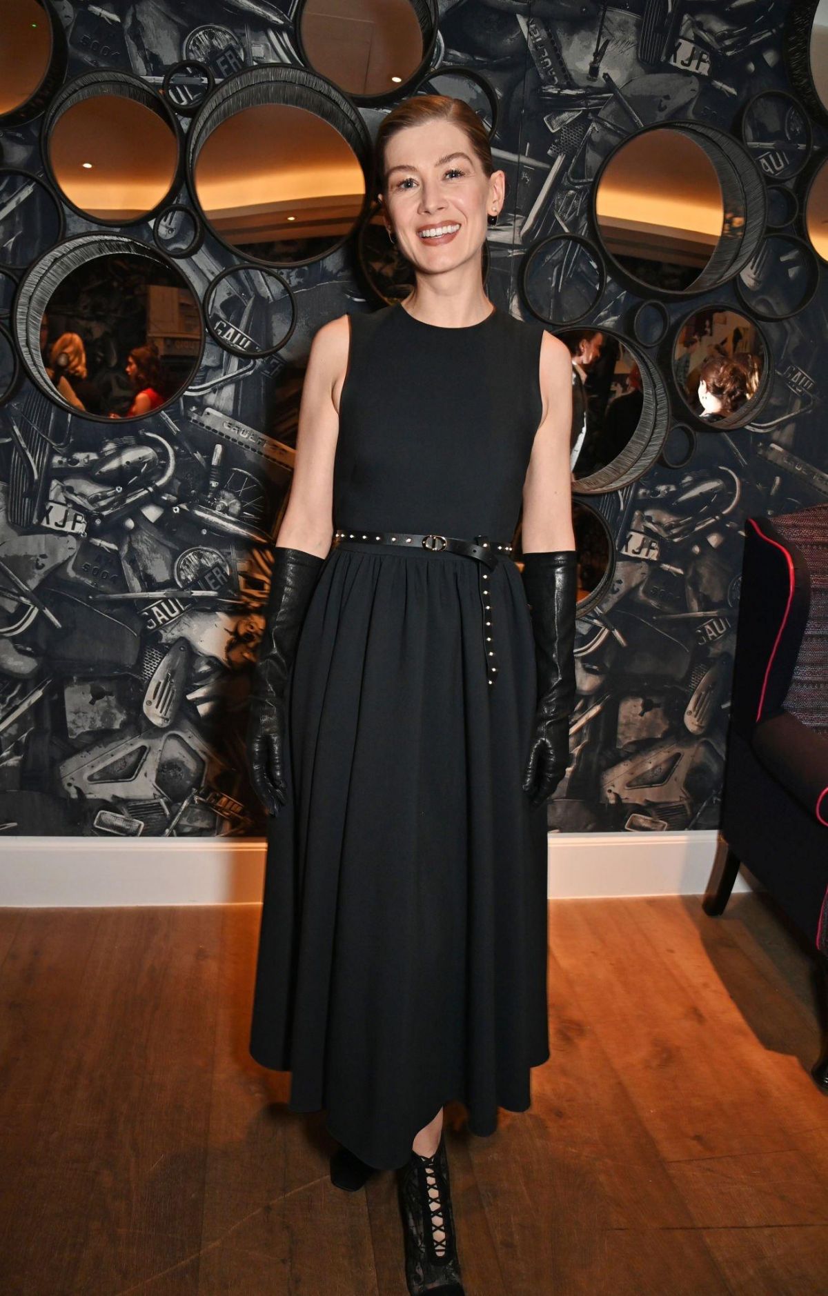 Rosamund Pike in Black Dress at Saltburn Screening in London