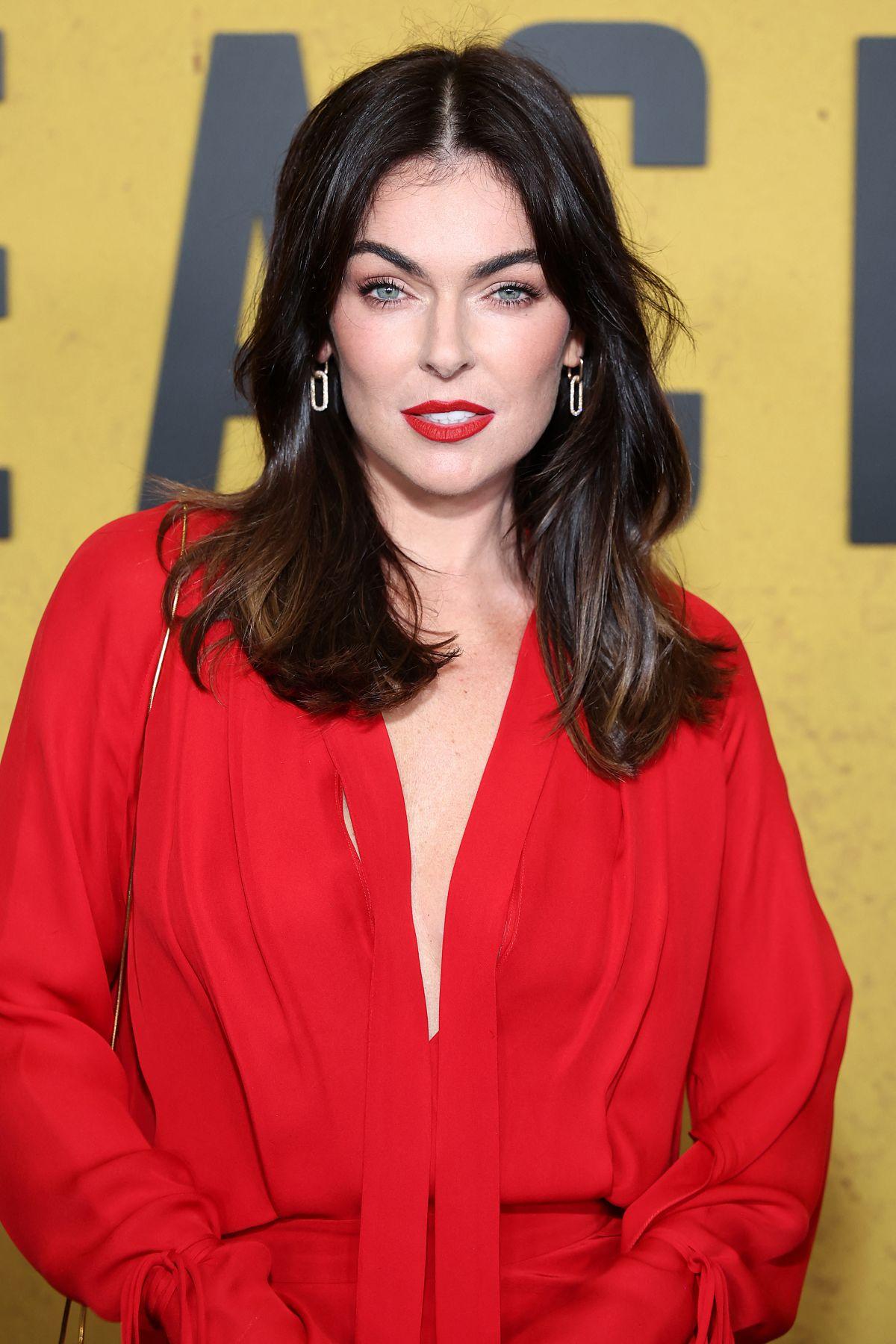 Serinda Swan in Red Dress at Reacher Season 2 screening at Culver City