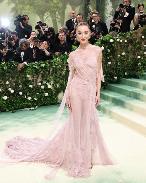 Phoebe Dynevor wearing in Victoria Beckham light pink dress at Met Gala 2024