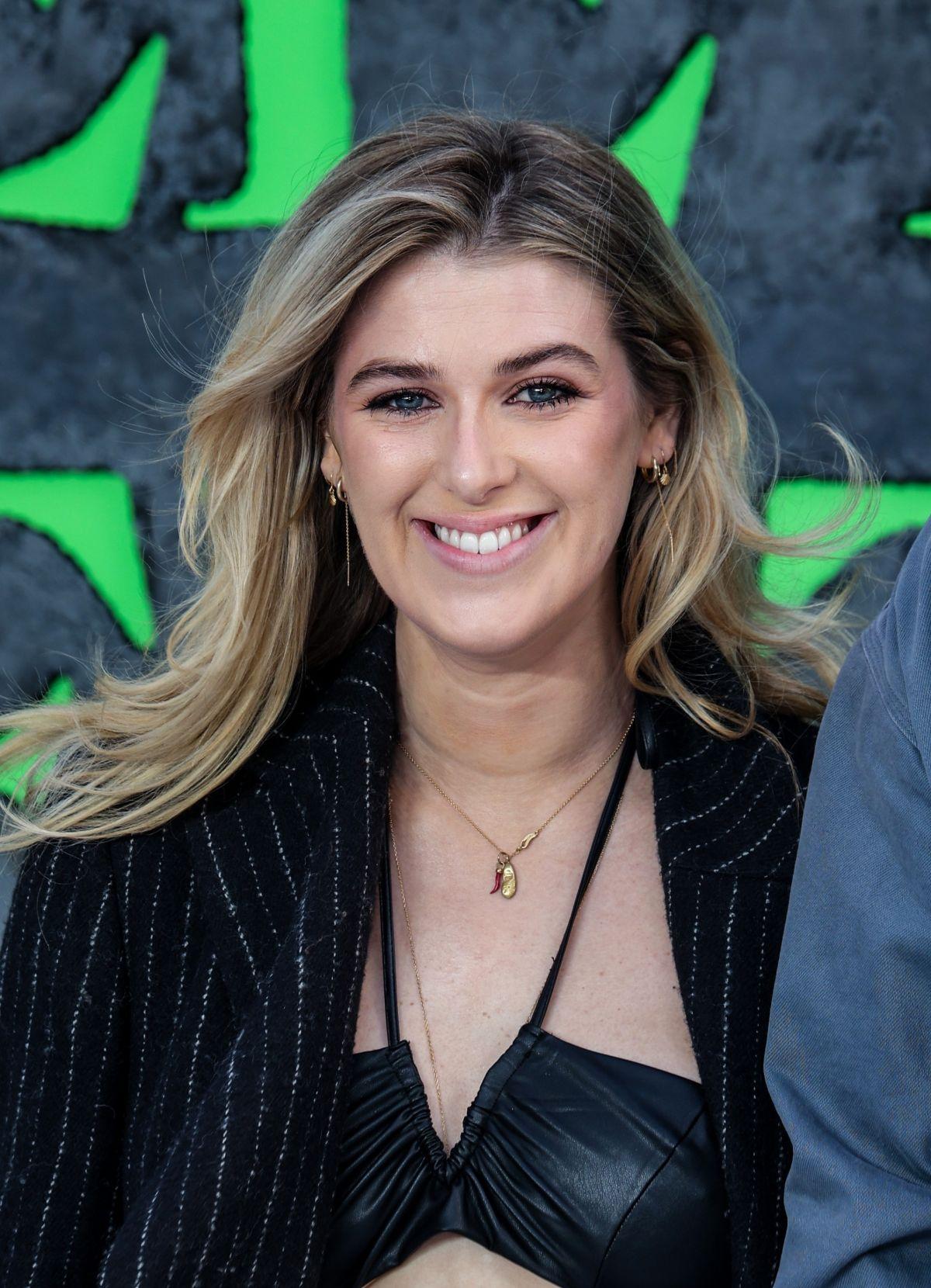 Honor Swinton Byrne in Black Dress at Beetlejuice Beetlejuice Premiere 2024 in London