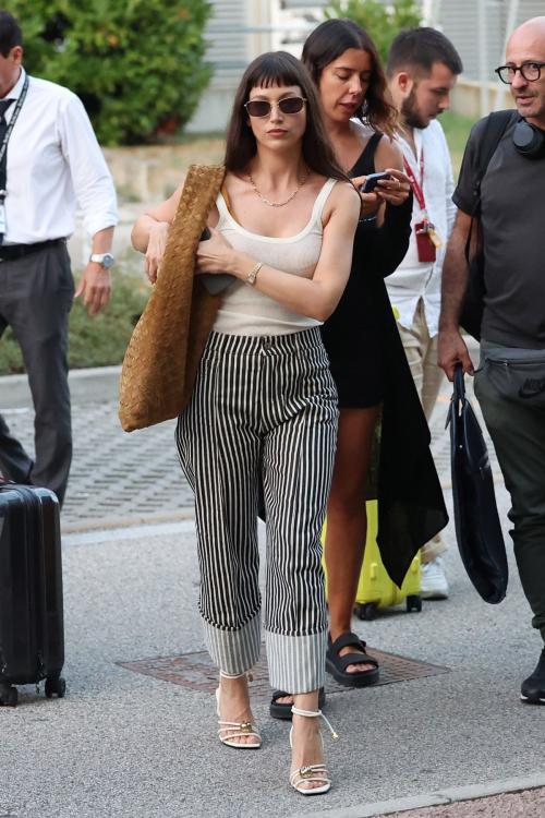 Ursula Corbero in White Top with Linen Pants seen at Marco Polo Airport in Venice, August 2024 3