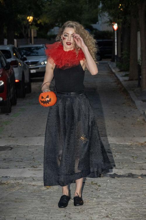 Amber Heard in Quirky Clown Makeup and Red Ruff Collar Celebrates Halloween, October 2024 6