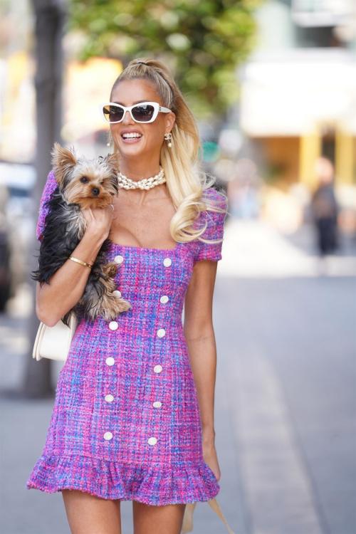 Emma Hernan Walks Her Dogs Outside Oppenheim Group, Feb 2025 6