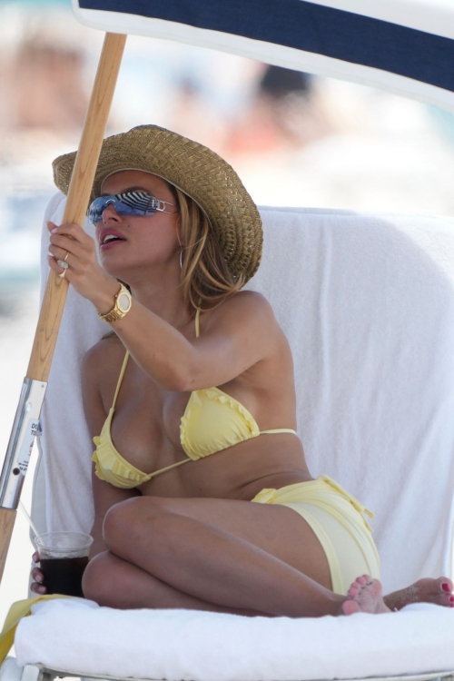 Brooks Nader in Yellow Bikini on Beach in Miami, May 2025 7