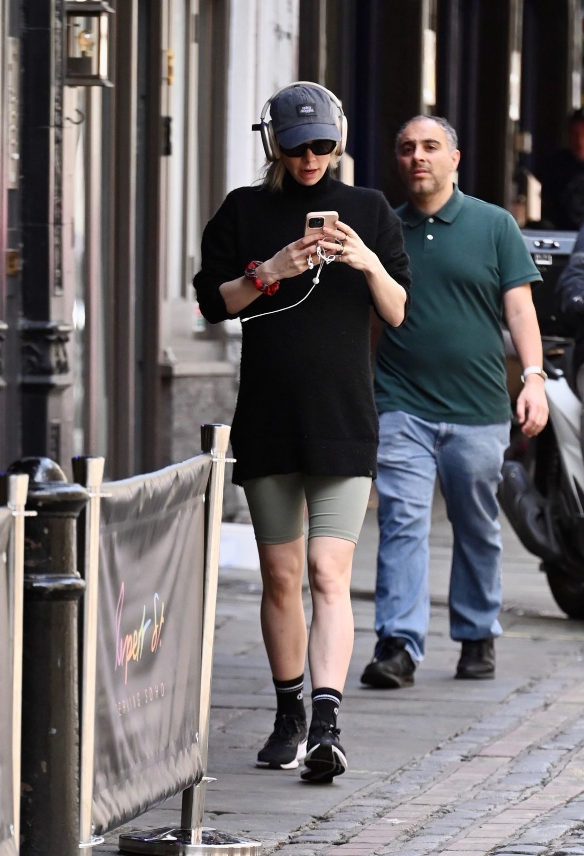 Pregnant Vanessa Kirby power walking in London, June 2025