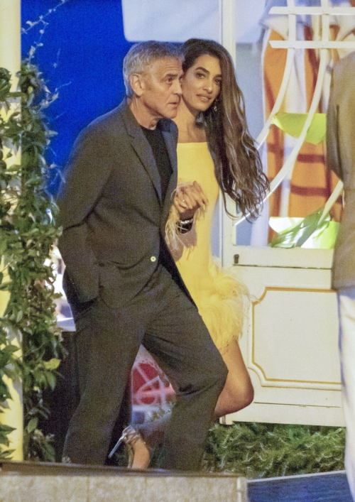 Amal and George Clooney arrive for dinner in Lake Como, August 2025