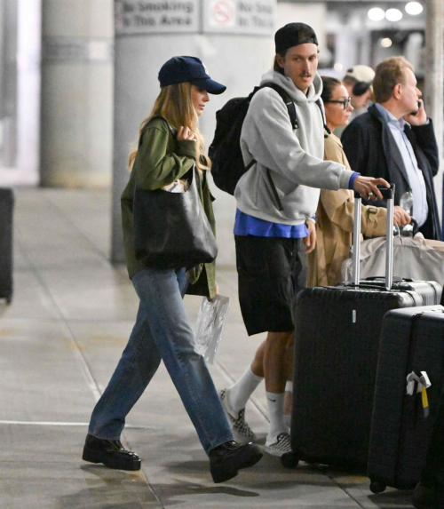 Margot Robbie with Cameron Land JFK, September 2025 2
